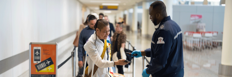passengers at the airport screening checkpoint